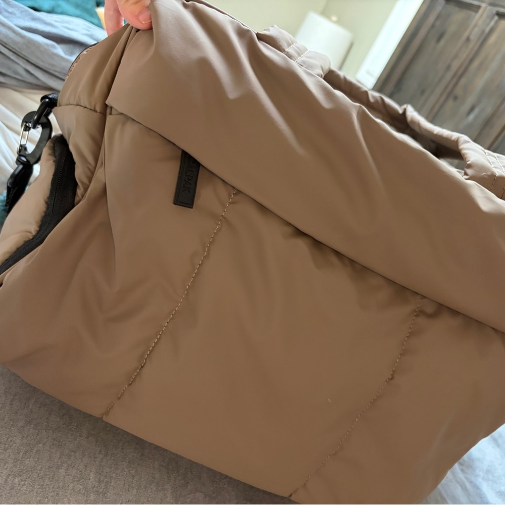 Calpak Luka duffle and luka passport holder in chocolate